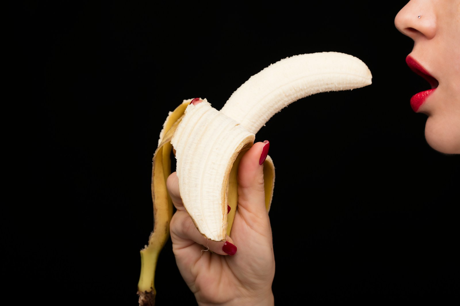 Ce inseamna sex oral person holding yellow banana fruit